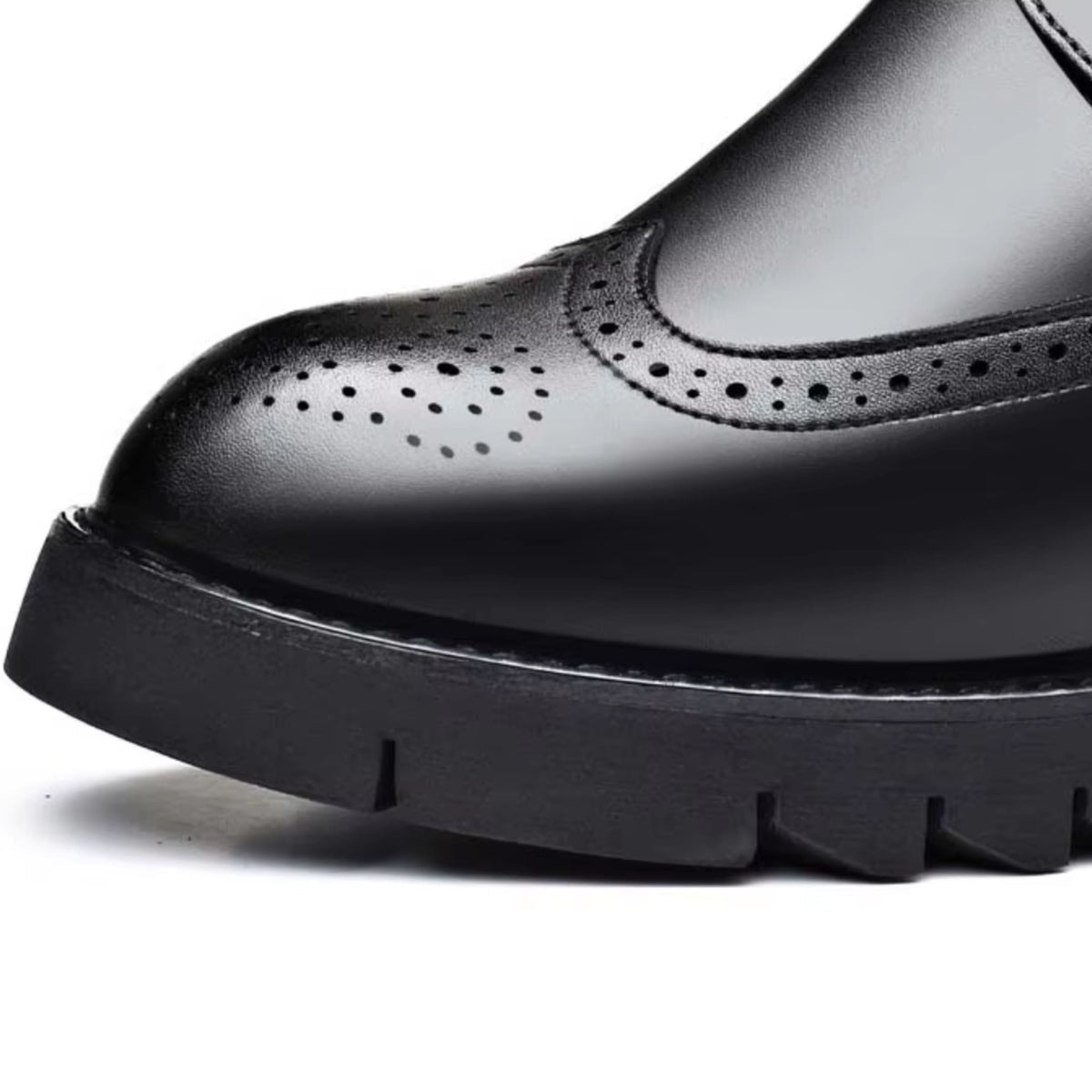FORCIANO GRANDIOR black Height Increasing Shoes close-up showing the perforated premium leather toe and thick black outsole.