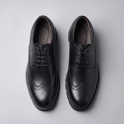 FORCIANO GRANDIOR black Height Increasing Shoes shown as a pair from the top with premium leather uppers, leather lining and perforated detailing.