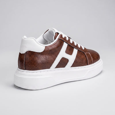 FORCIANO HAZEL brown women's platform sneaker in rear three-quarter view, showing the premium leather upper, white accents and raised white sole.