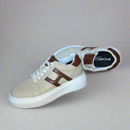 FORCIANO HERCULES beige Height Increasing Sneakers in premium leather arranged as a pair in a diagonal view with brown side accents, white laces, and white soles.
