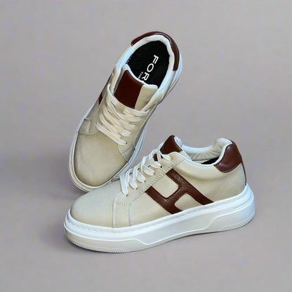Pair of FORCIANO HERCULES beige premium leather Height Increasing Sneakers shown from a front three-quarter and top angle with brown detailing and white soles.