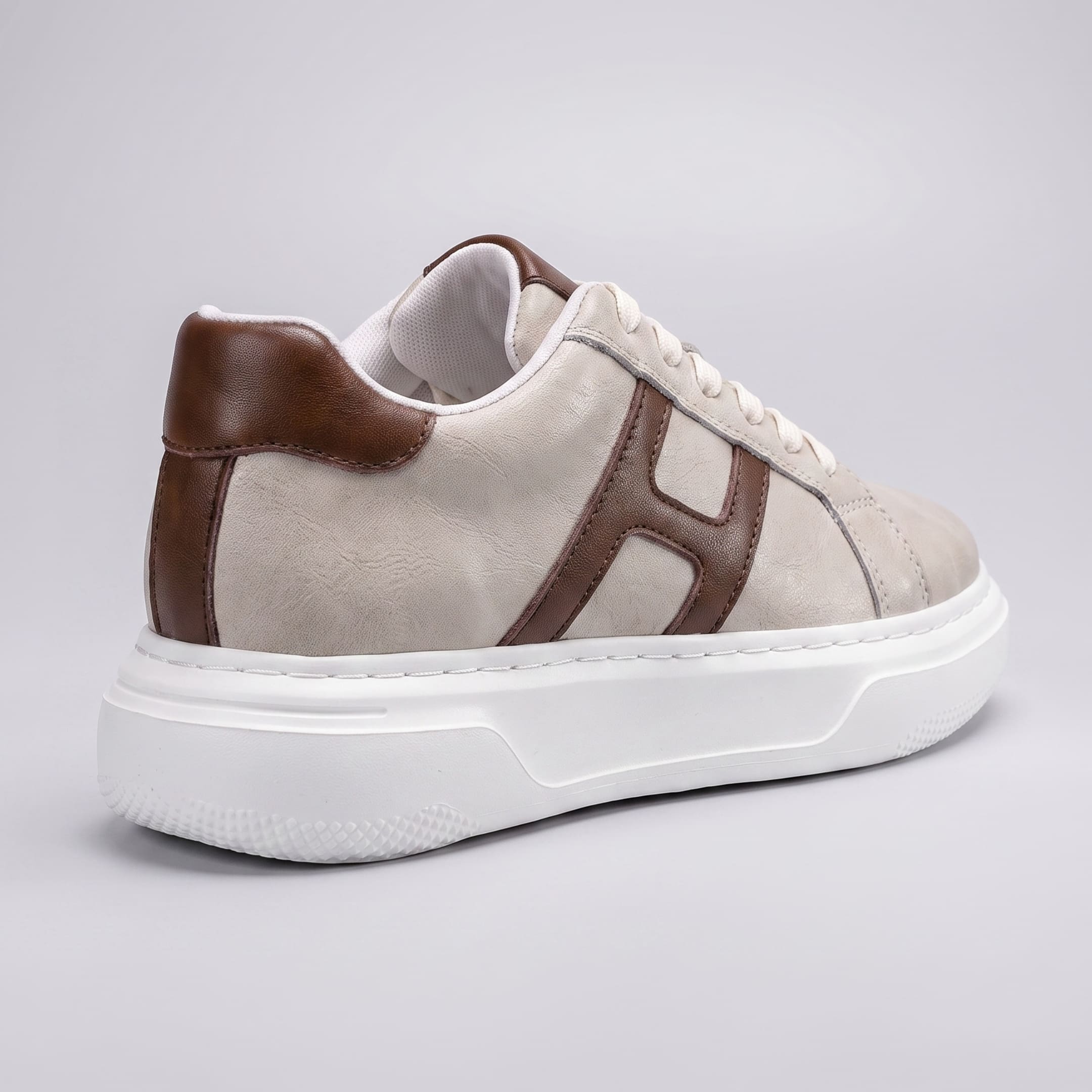 FORCIANO HERCULES beige premium leather Height Increasing Sneaker in a rear three-quarter view with brown side detailing and white sole.