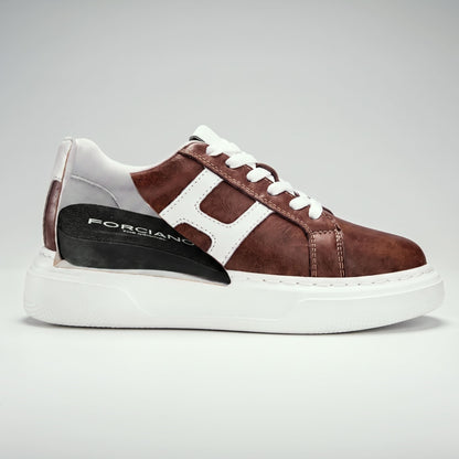 FORCIANO HERCULES brown Height Increasing Sneaker in side cutaway view showing the black internal lift insert beneath the premium leather exterior.