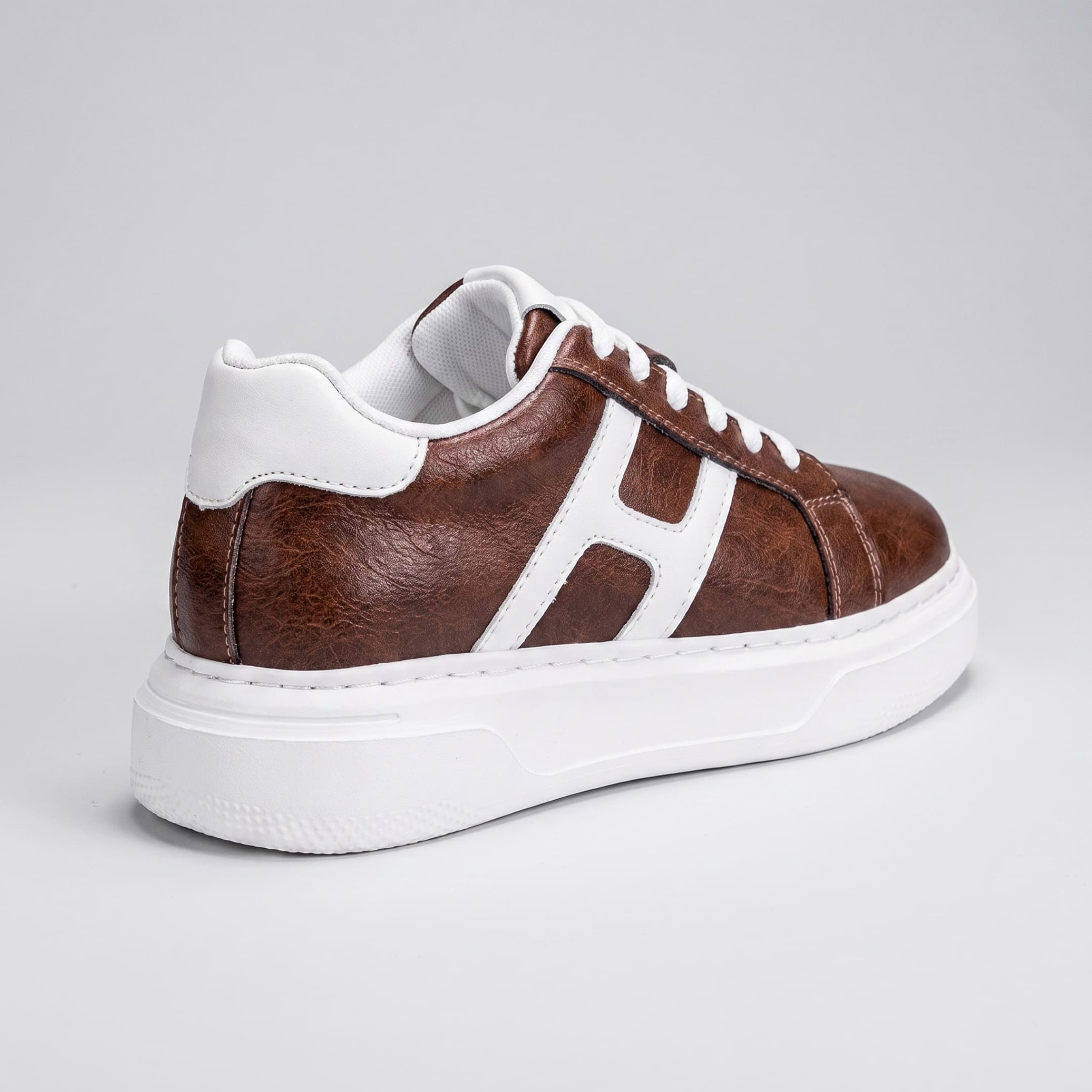 FORCIANO HERCULES brown premium leather Height Increasing Sneaker in a rear three-quarter view with white side detailing and white sole.