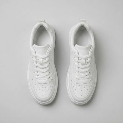 FORCIANO IMPACT white sneakers shown as a pair from above, highlighting the laces, perforated toe panels and leather uppers.