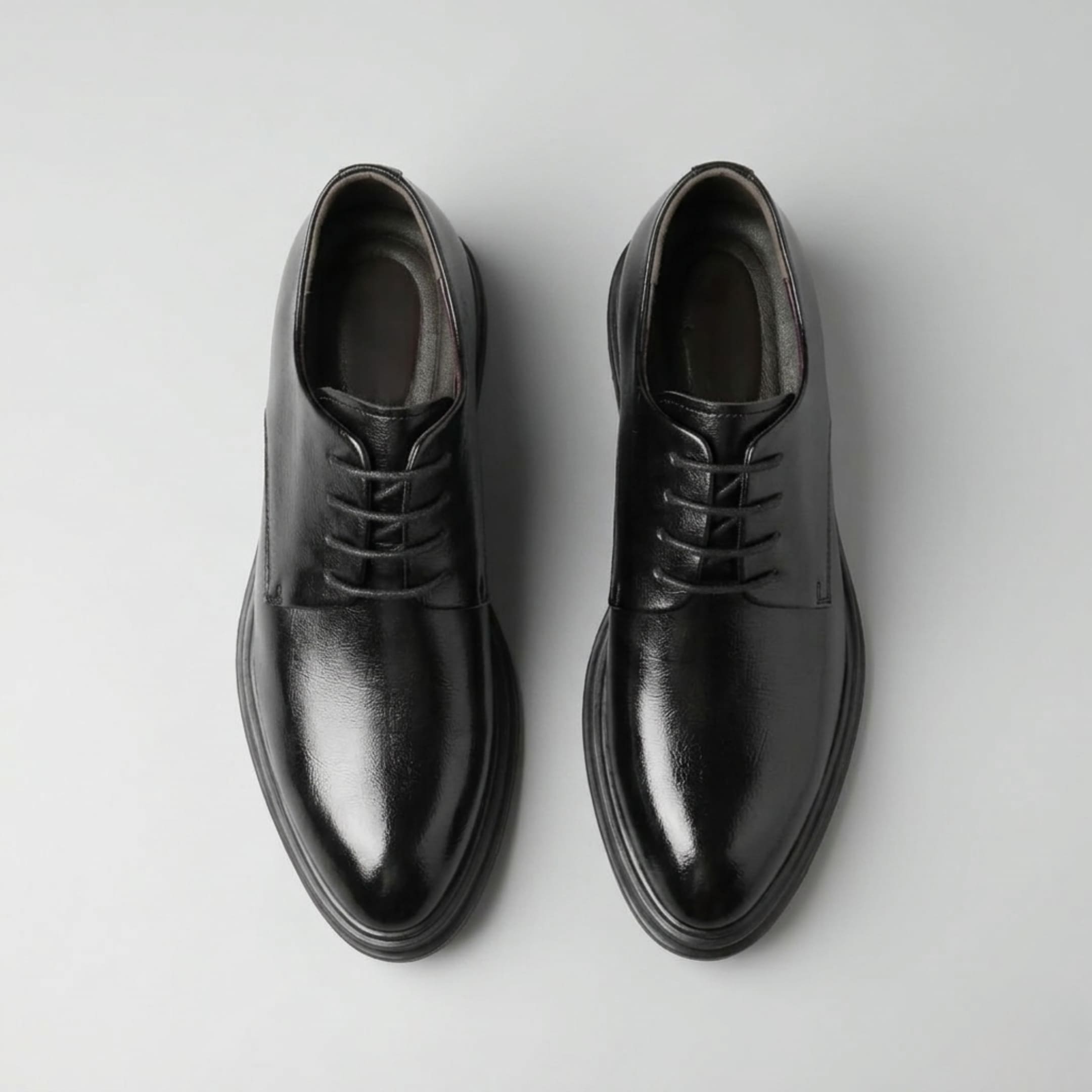 FORCIANO IMPERIAL black premium leather dress shoes displayed in a top view showing the pair, black laces and polished uppers.