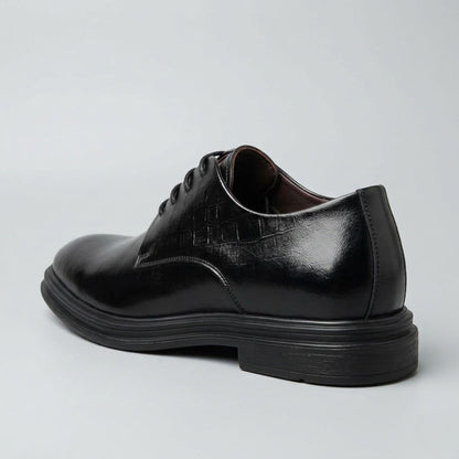 FORCIANO IMPERIAL black premium leather dress shoe in a rear three-quarter view highlighting the heel and layered black sole.