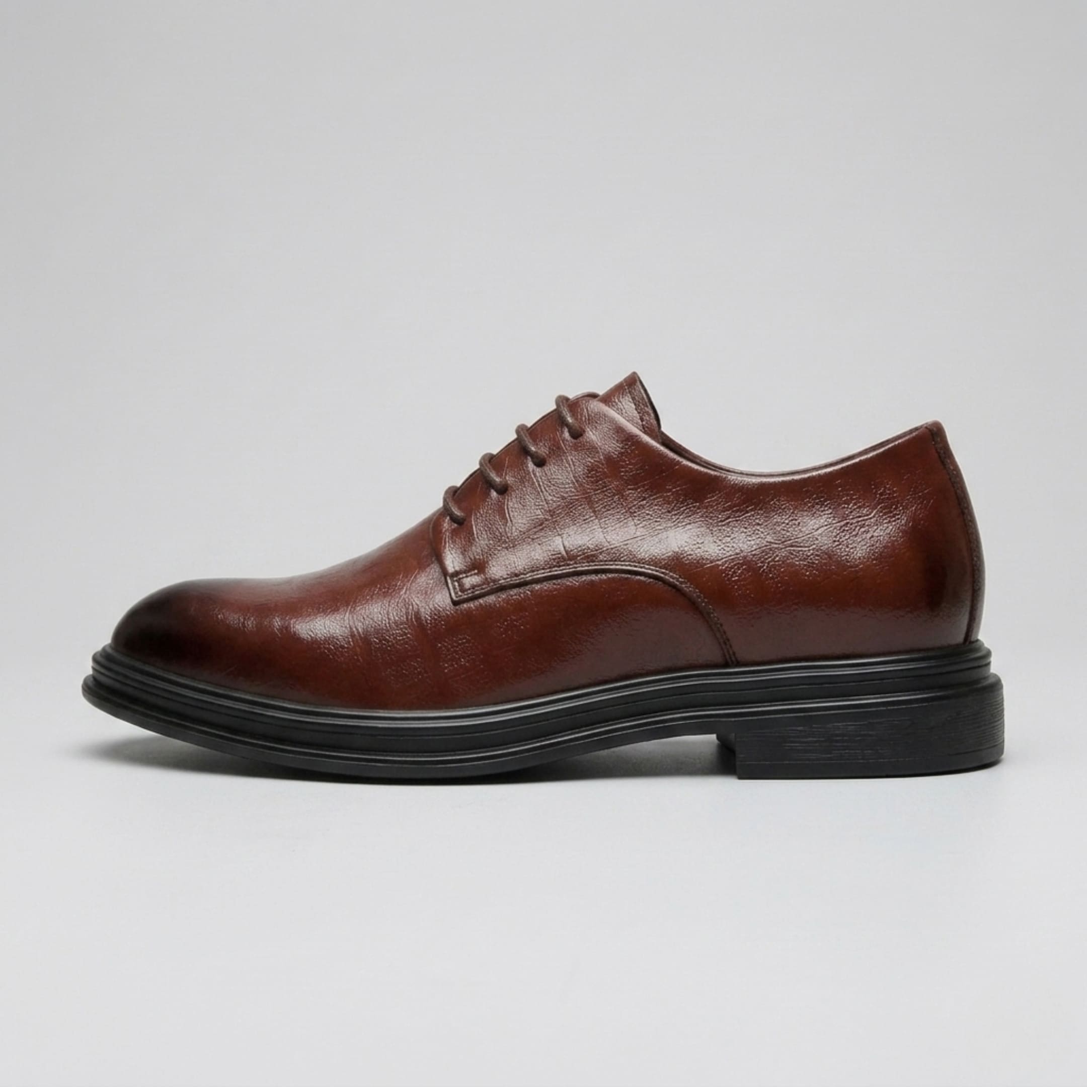 FORCIANO IMPERIAL brown premium leather dress shoe in a clean side profile with black sole and lace-up design.