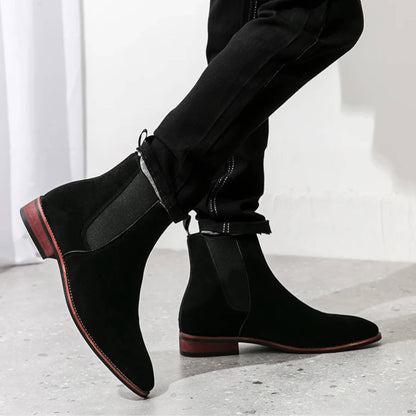 FORCIANO IVORY black suede elevator boots worn in a side lifestyle view with elastic Chelsea panels.