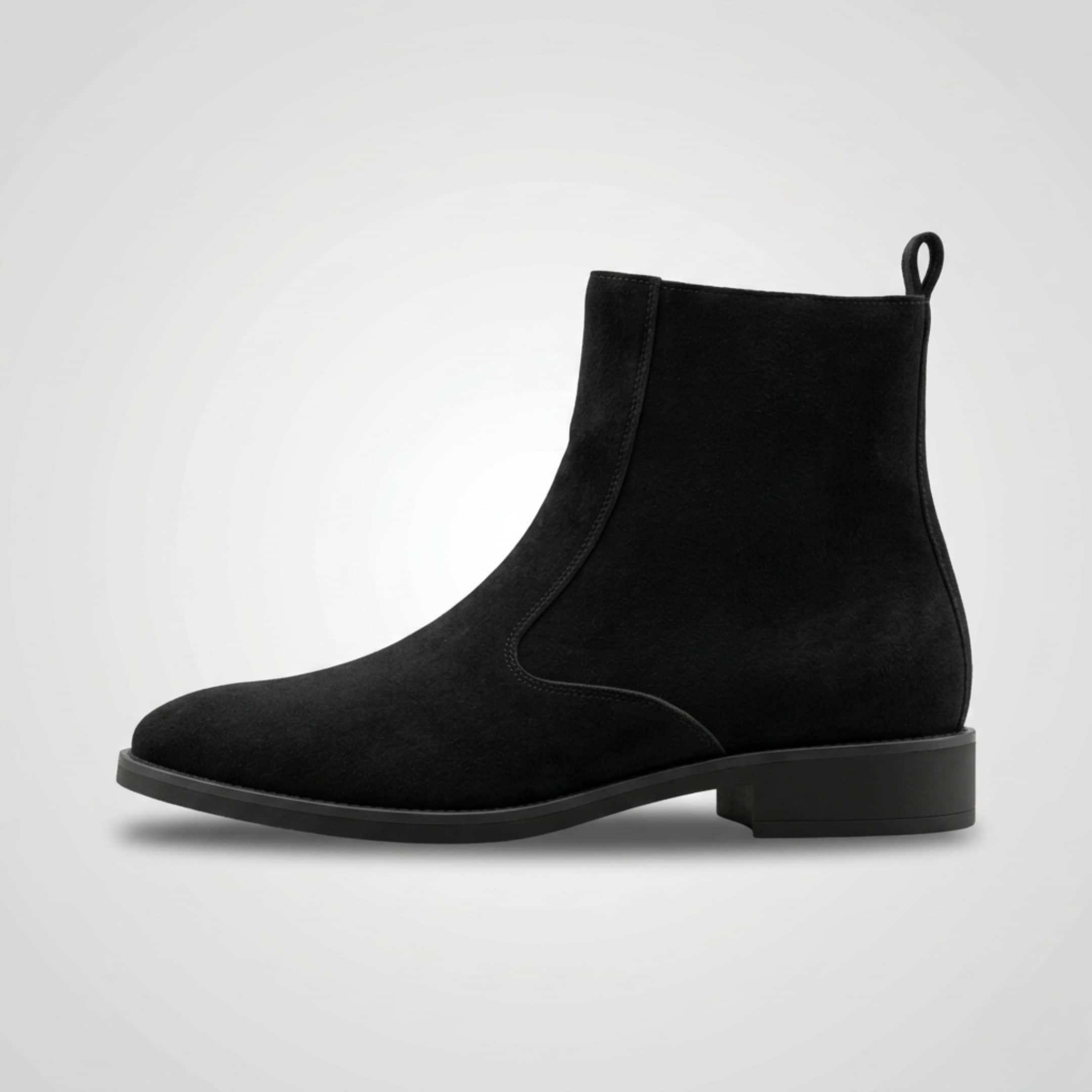 FORCIANO IVORY black suede elevator boots shown in a clean side profile with ankle-height silhouette.