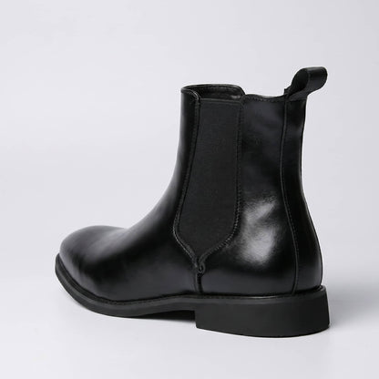FORCIANO LUXOR black leather Elevator Shoes shown from a rear three-quarter angle with elastic side panel.