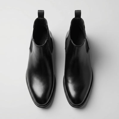 FORCIANO LUXOR black leather height increasing Elevator Shoes shown as a pair from a top-front view.
