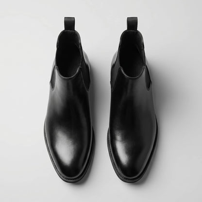 FORCIANO LUXOR black leather height increasing Elevator Shoes shown as a pair from a top-front view.
