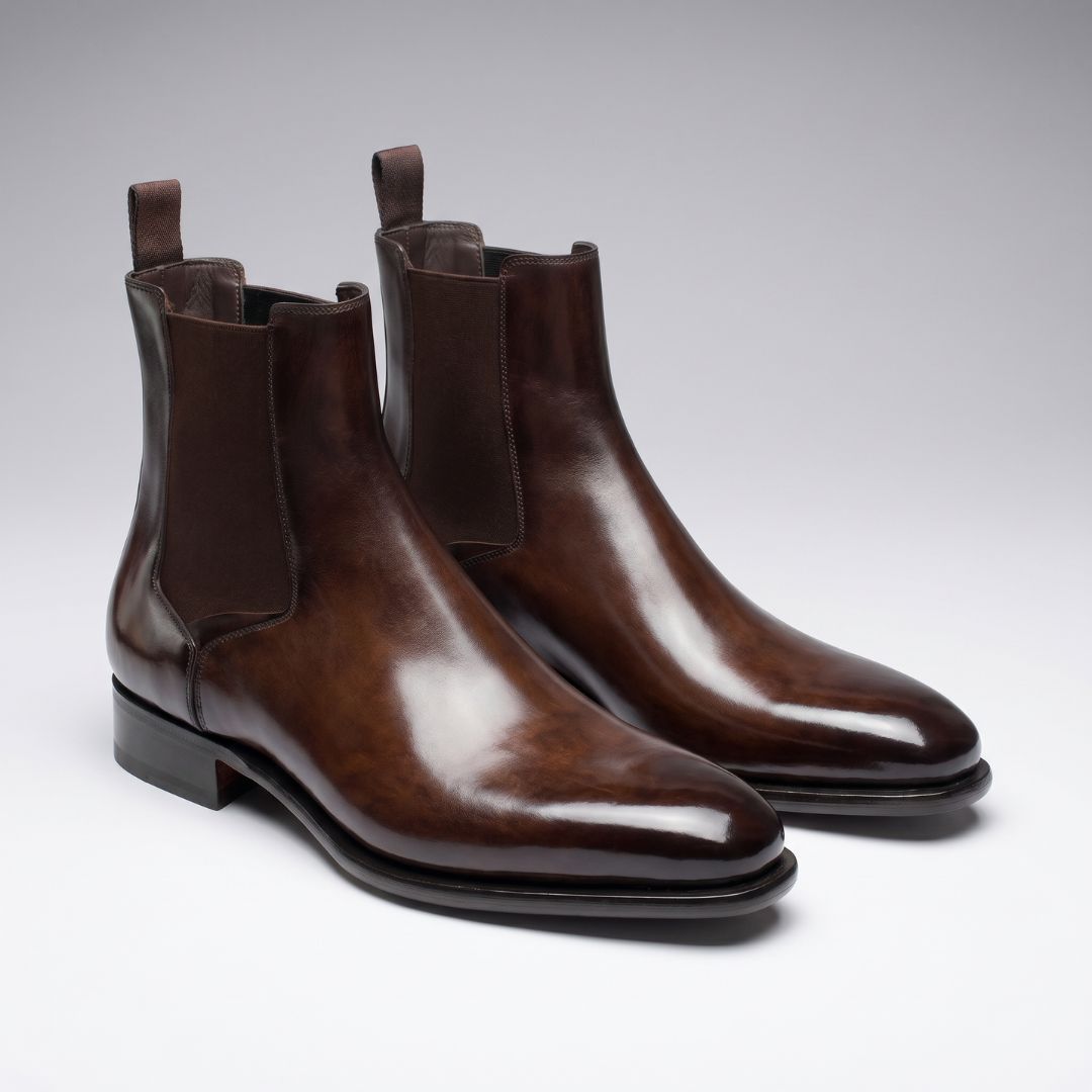 FORCIANO LUXOR brown elevator Chelsea boots shown as a pair in an angled view with elastic side panels and pull tabs.