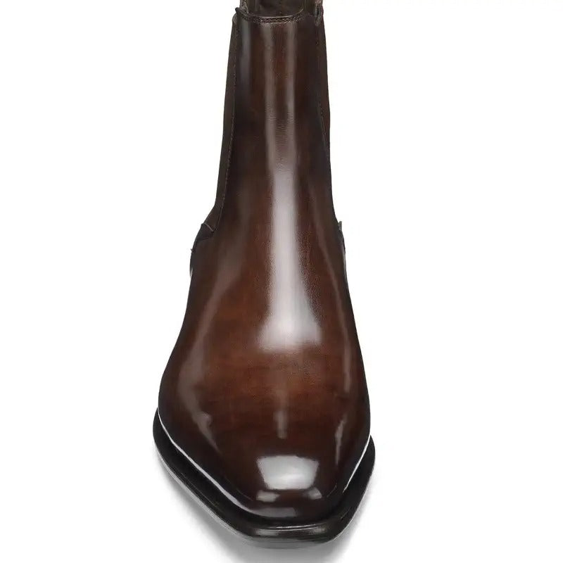 FORCIANO LUXOR brown leather height increasing boots shown from the front with the polished toe clearly visible.
