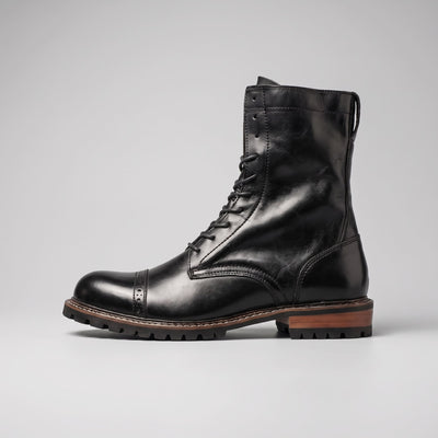 FORCIANO MARSHAL black height increasing boots with genuine leather upper shown from the side.