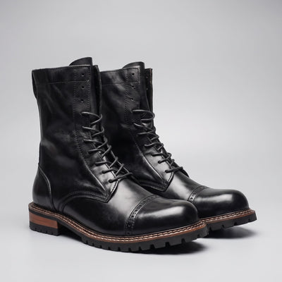FORCIANO MARSHAL black height increasing boots with genuine leather uppers shown as a pair from a front three-quarter angle.
