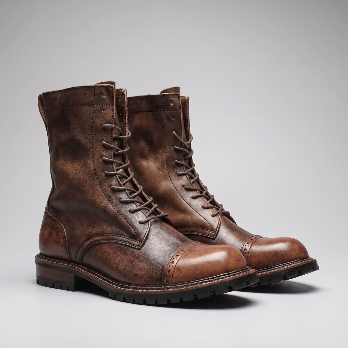 FORCIANO MARSHAL brown height increasing boots with genuine leather uppers shown as a pair from a front three-quarter angle.
