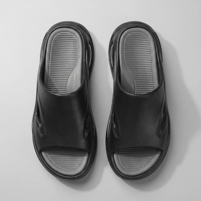 Pair of black and gray FORCIANO MAVERICK Height Increasing Shoes shown from an overhead view with gray textured footbeds.