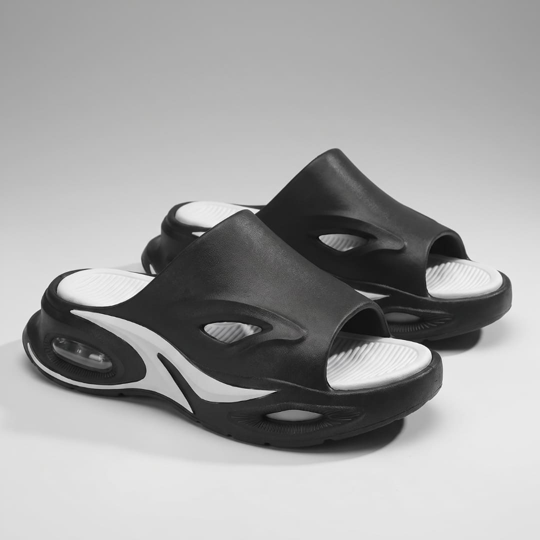 Pair of black and white FORCIANO MAVERICK Height Increasing Shoes shown from a front three-quarter angle with contrasting footbeds.