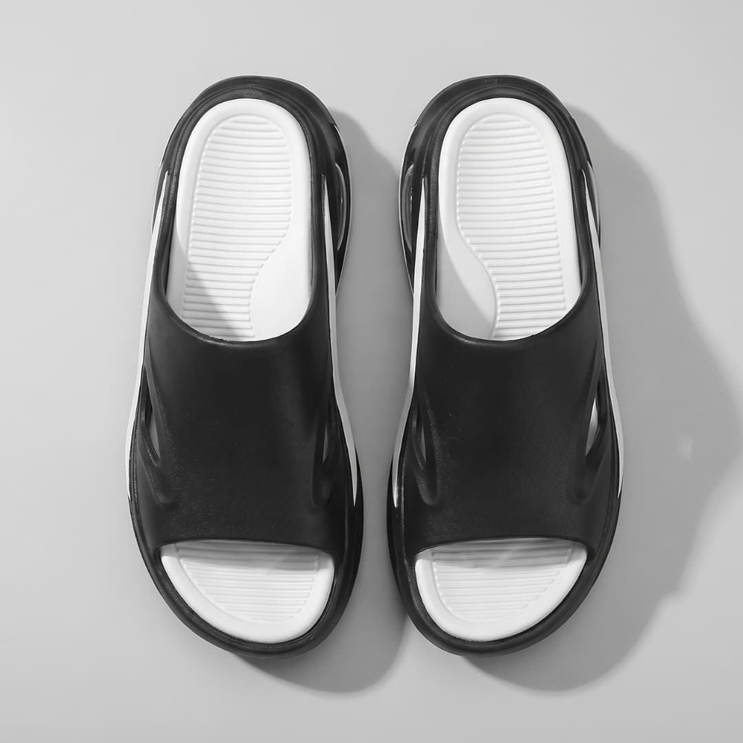 Black and white FORCIANO MAVERICK Height Increasing Shoes shown as a pair from the top with contrasting footbeds.