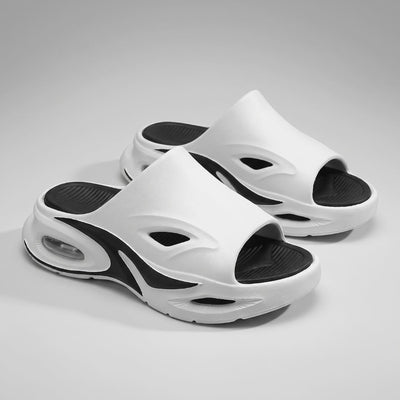 Pair of white and black FORCIANO MAVERICK Height Increasing Shoes shown from a front three-quarter angle.