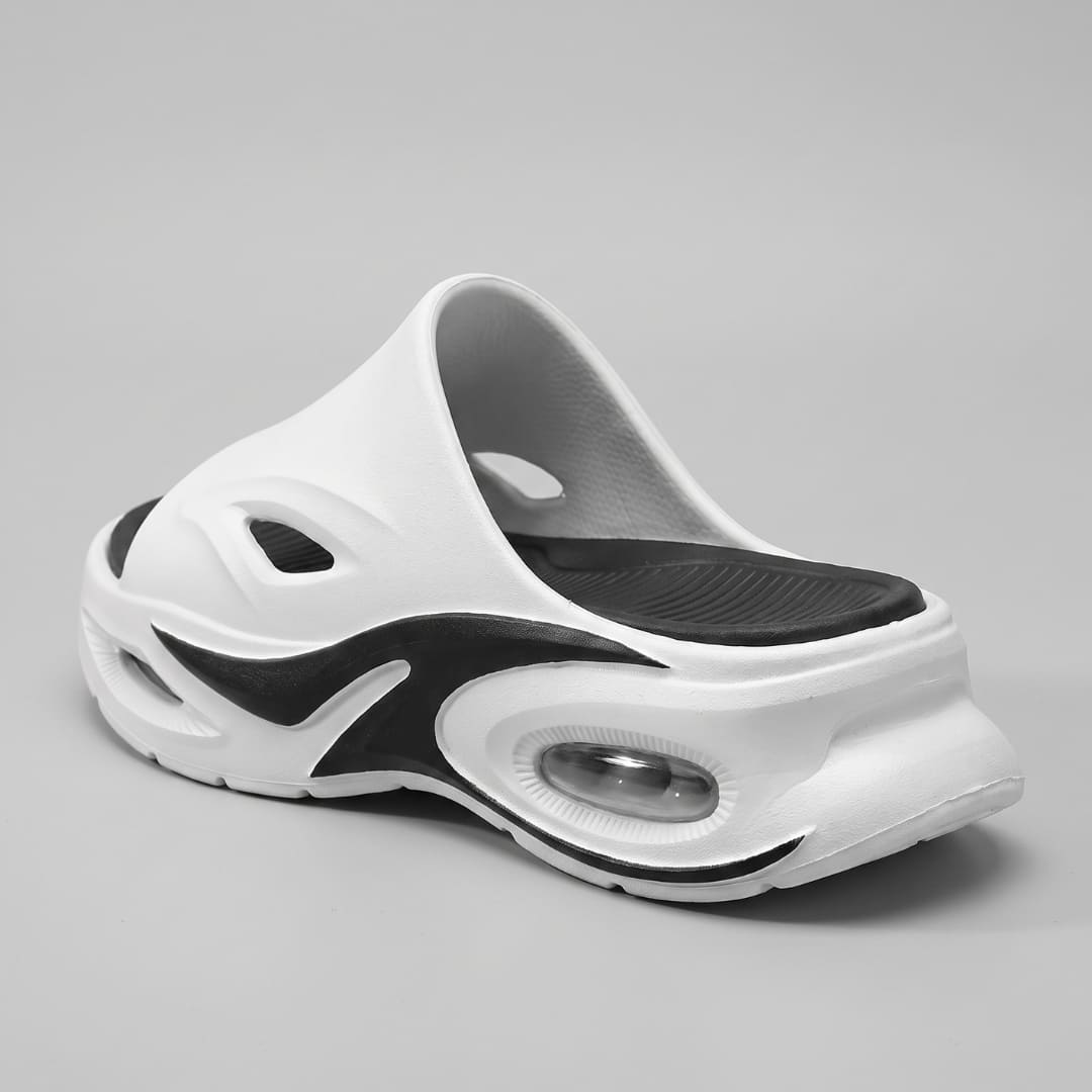 White and black FORCIANO MAVERICK Height Increasing Shoes shown from a rear three-quarter angle with visible heel construction.
