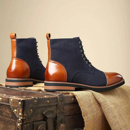 Pair of FORCIANO MERIDIAN dark blue elevator boots shown from side and rear three-quarter angles, highlighting the brown heel panels.