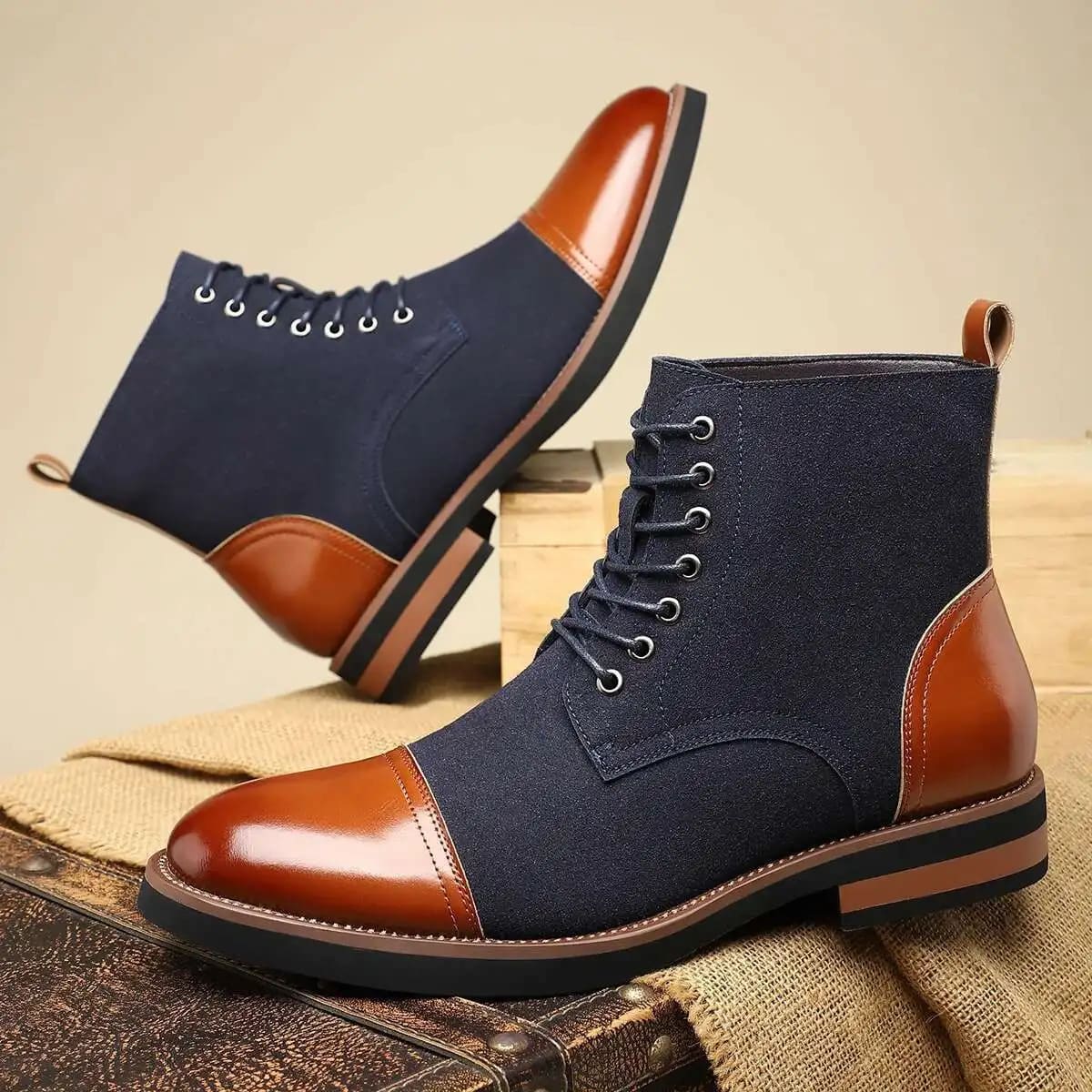 FORCIANO MERIDIAN dark blue elevator boots with brown toe and heel accents, shown as a pair in side and angled views.