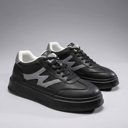 FORCIANO MILANO black elevator sneakers shown as a pair from a front three-quarter angle with leather upper and gray side detailing.