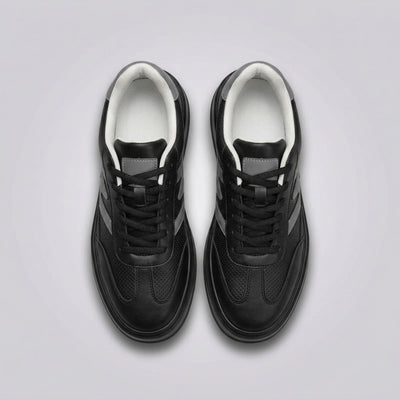 FORCIANO MILANO black elevator sneakers shown as a pair from above with black laces, leather upper, gray accents and white inner lining.