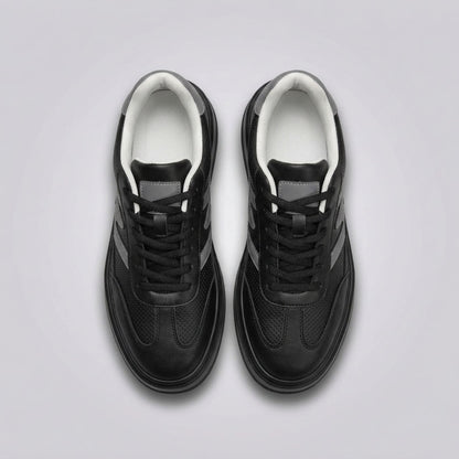 FORCIANO MILANO black elevator sneakers shown as a pair from above with black laces, leather upper, gray accents and white inner lining.