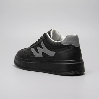 FORCIANO MILANO black height boosting sneakers shown from the rear three-quarter angle with leather upper, gray heel accent and black raised sole.