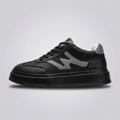 FORCIANO MILANO black height increasing shoes in sneaker side profile with leather upper, gray side accents and black platform sole.
