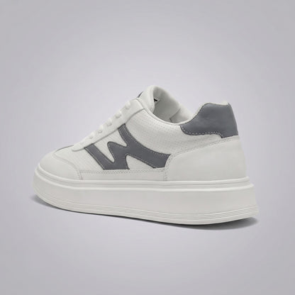 FORCIANO MILANO white height increasing sneakers shown from the rear three-quarter angle with leather upper, gray heel accent and raised white sole.
