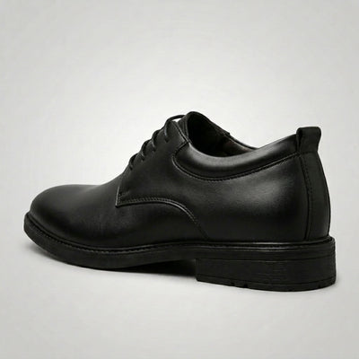 FORCIANO MOMENTUM black Elevator Dress Shoes shown from a rear side angle with the heel and lace-up design visible.