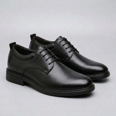FORCIANO MOMENTUM black height increasing dress shoes shown as a pair from a polished front three-quarter angle.