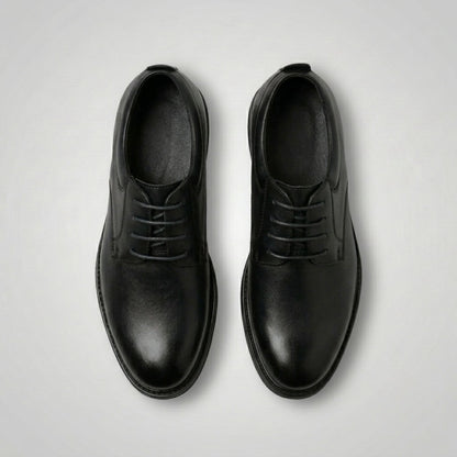 FORCIANO MOMENTUM black height increasing dress shoes shown as a pair from the top, highlighting the lace-up design.