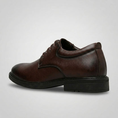 FORCIANO MOMENTUM brown elevator dress shoe shown from the rear-side angle, highlighting the heel and formal profile.