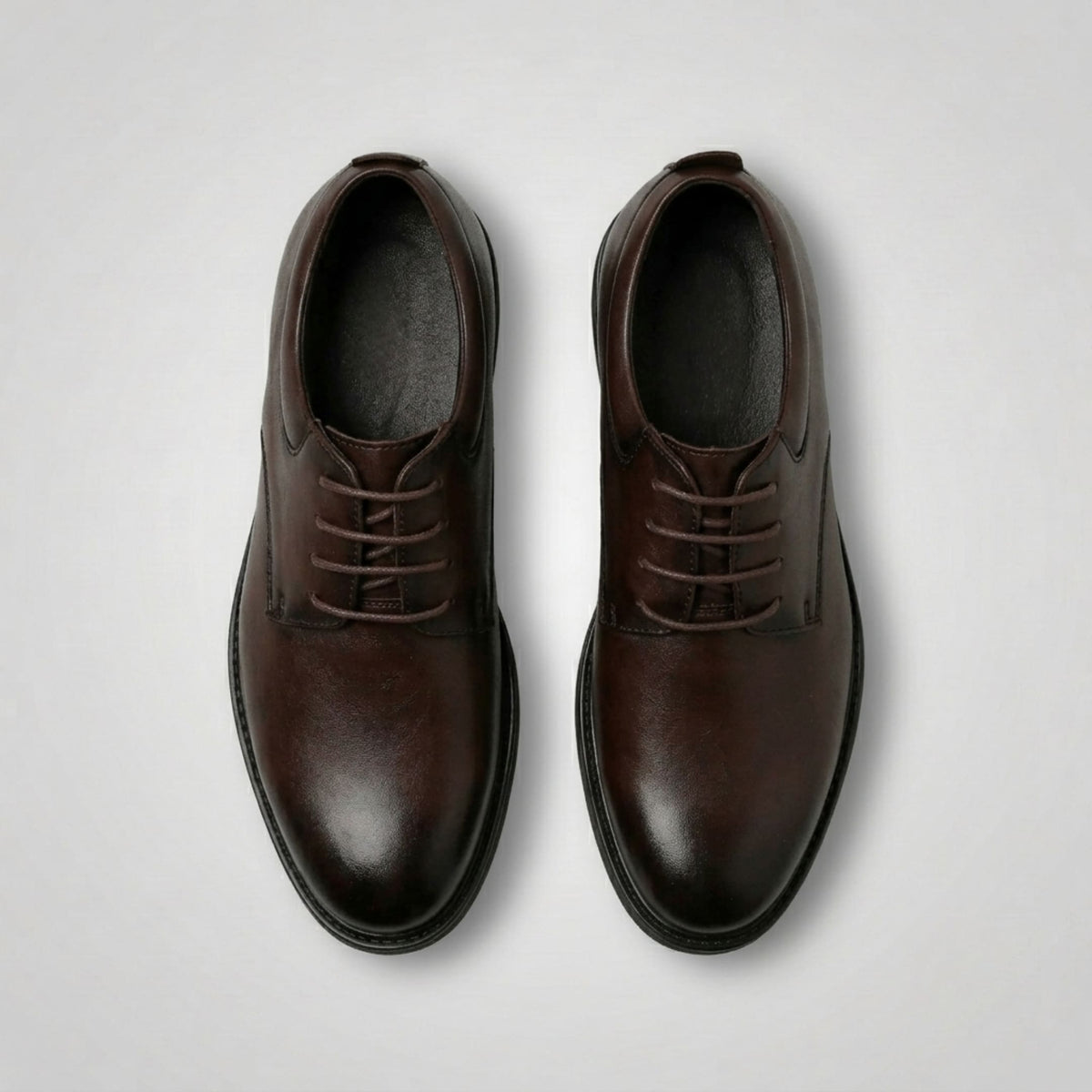 FORCIANO MOMENTUM brown Elevator Dress Shoes shown as a pair from the top view with the lace-up fronts visible.