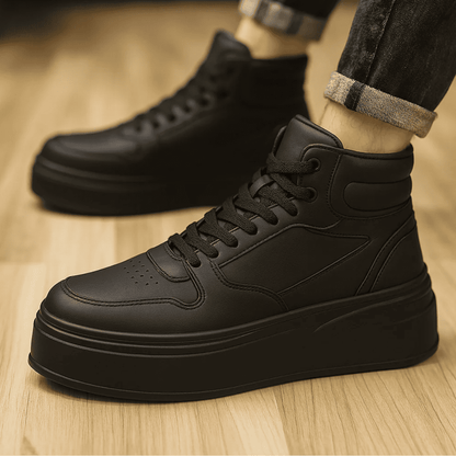 FORCIANO MONARCH black height increasing sneakers worn in a close side lifestyle view, showing the lace-up high-top design and raised sole.