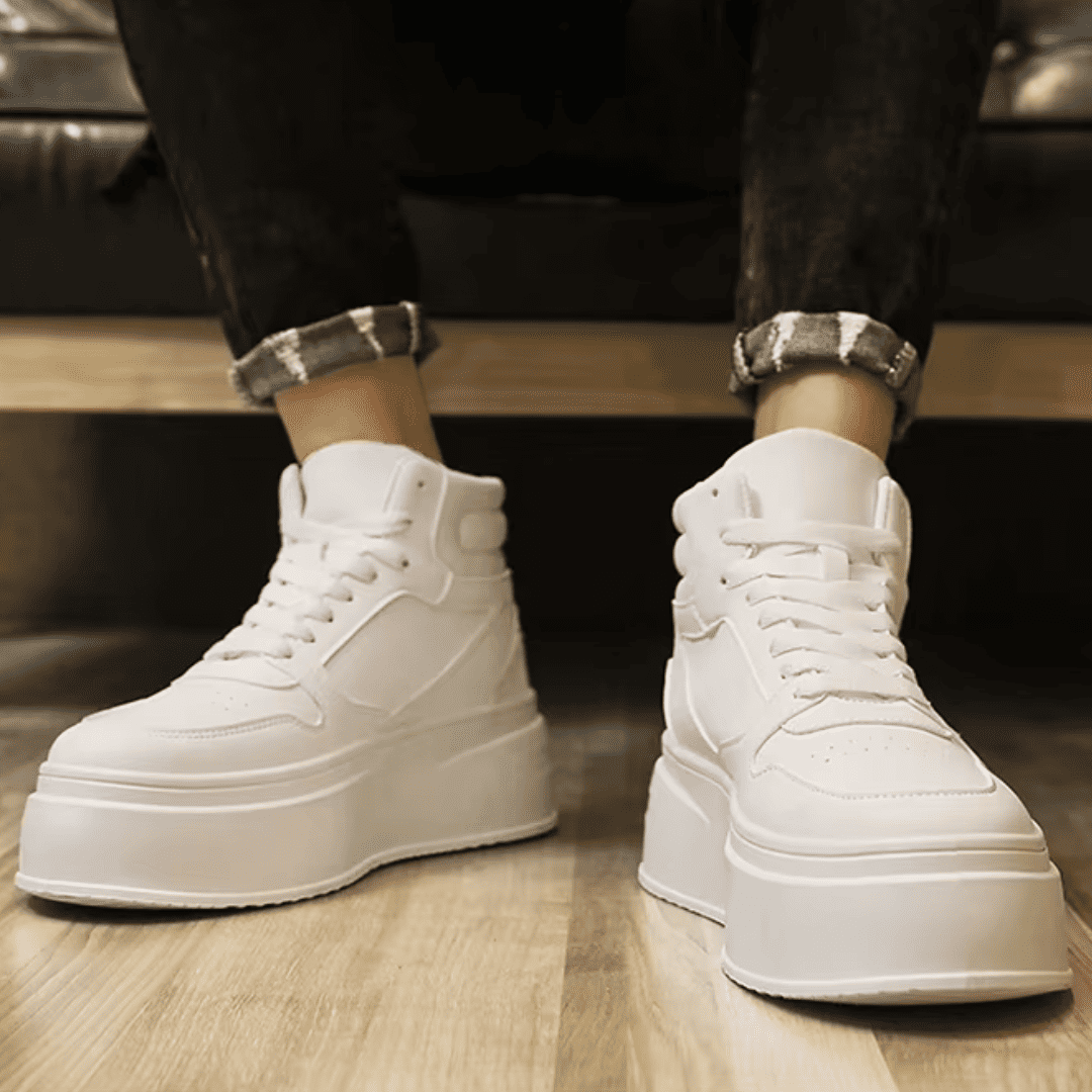 FORCIANO MONARCH white height increasing sneakers worn as a pair in a front lifestyle view, showing the high-top shape and raised soles.