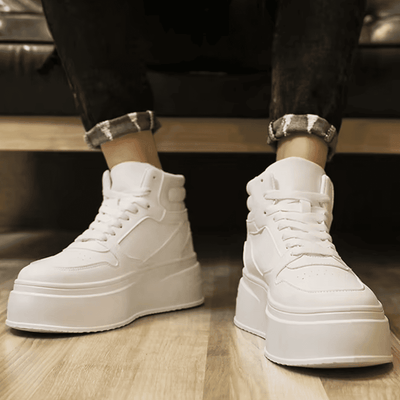 FORCIANO MONARCH white height increasing sneakers worn as a pair in a front lifestyle view, showing the high-top shape and raised soles.