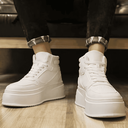 FORCIANO MONARCH white height increasing sneakers worn as a pair in a front lifestyle view, showing the high-top shape and raised soles.
