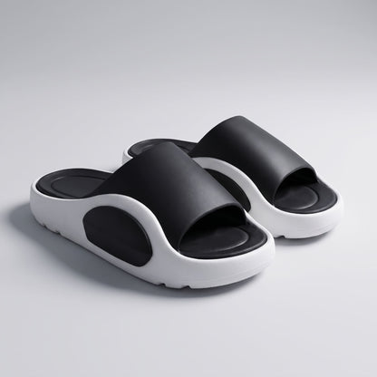 FORCIANO NEXUS black and white EVA sandals displayed as a pair from the front angle, showing the Height Boosting Shoes in a reversed two-tone design.