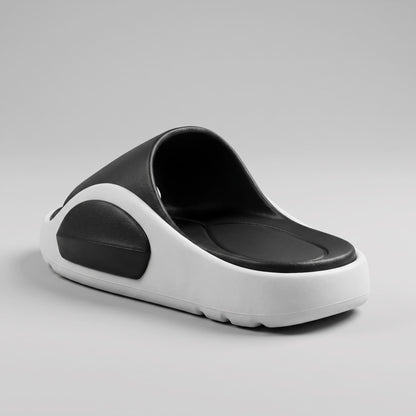 FORCIANO NEXUS black and white EVA sandal shown from a rear three-quarter angle with the footbed visible, presenting the Height Boosting Shoes.