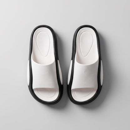 Top view of a pair of FORCIANO NEXUS white and black EVA sandals, showing the footbeds and straps of the Height Boosting Shoes.