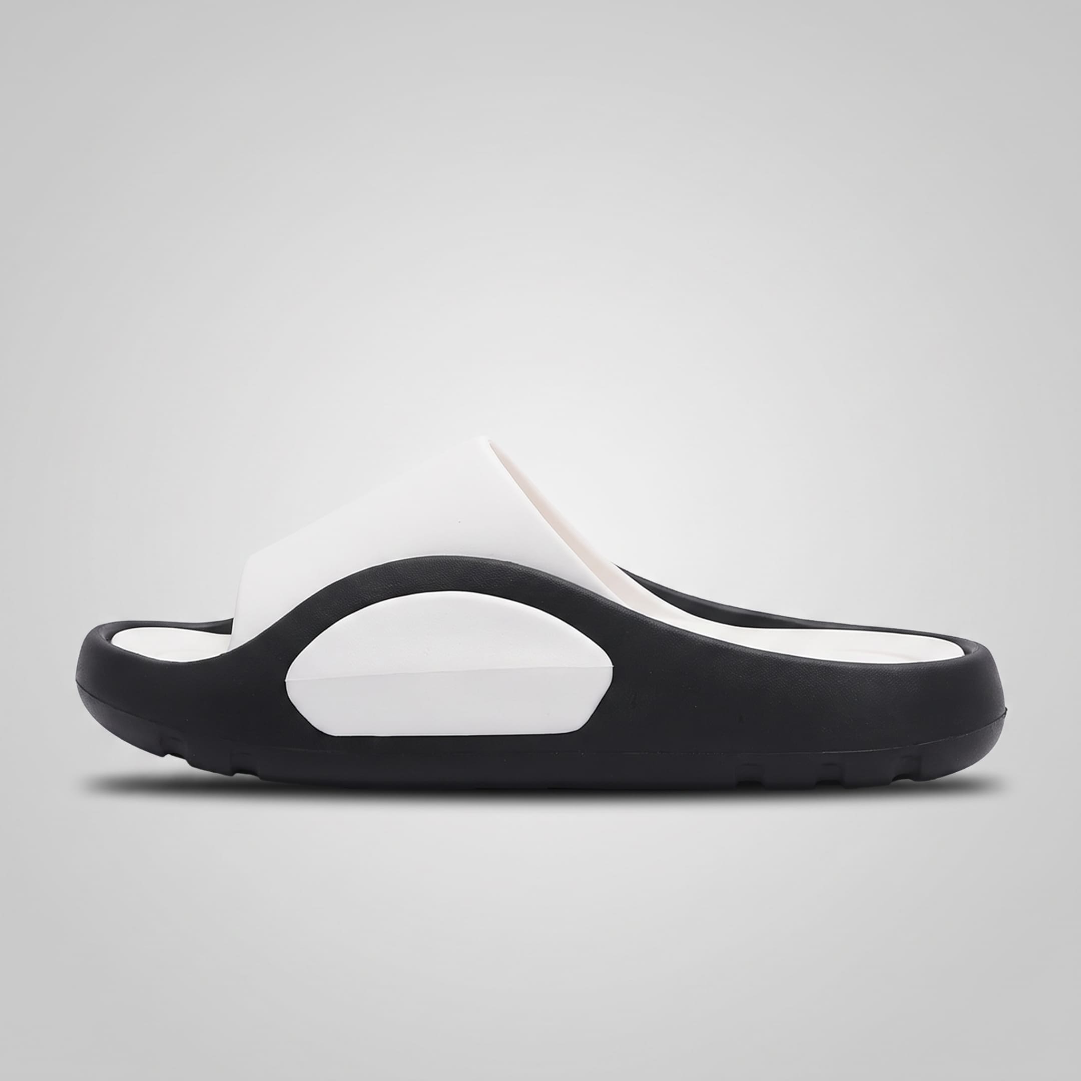FORCIANO NEXUS white and black EVA sandals shown in full side profile, highlighting the contrasting sole of the Height Boosting Shoes.