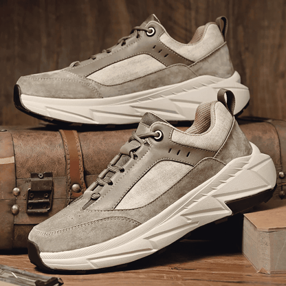 FORCIANO NORTHRIDGE beige height increasing sneakers displayed as a pair from angled side views with a wooden case in the background.