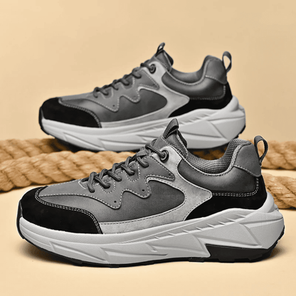 FORCIANO NORTHRIDGE gray and black height increasing sneakers displayed as a pair in side-profile views with white soles.